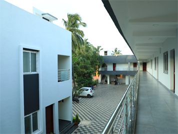 Side view of Sivavel Residency building