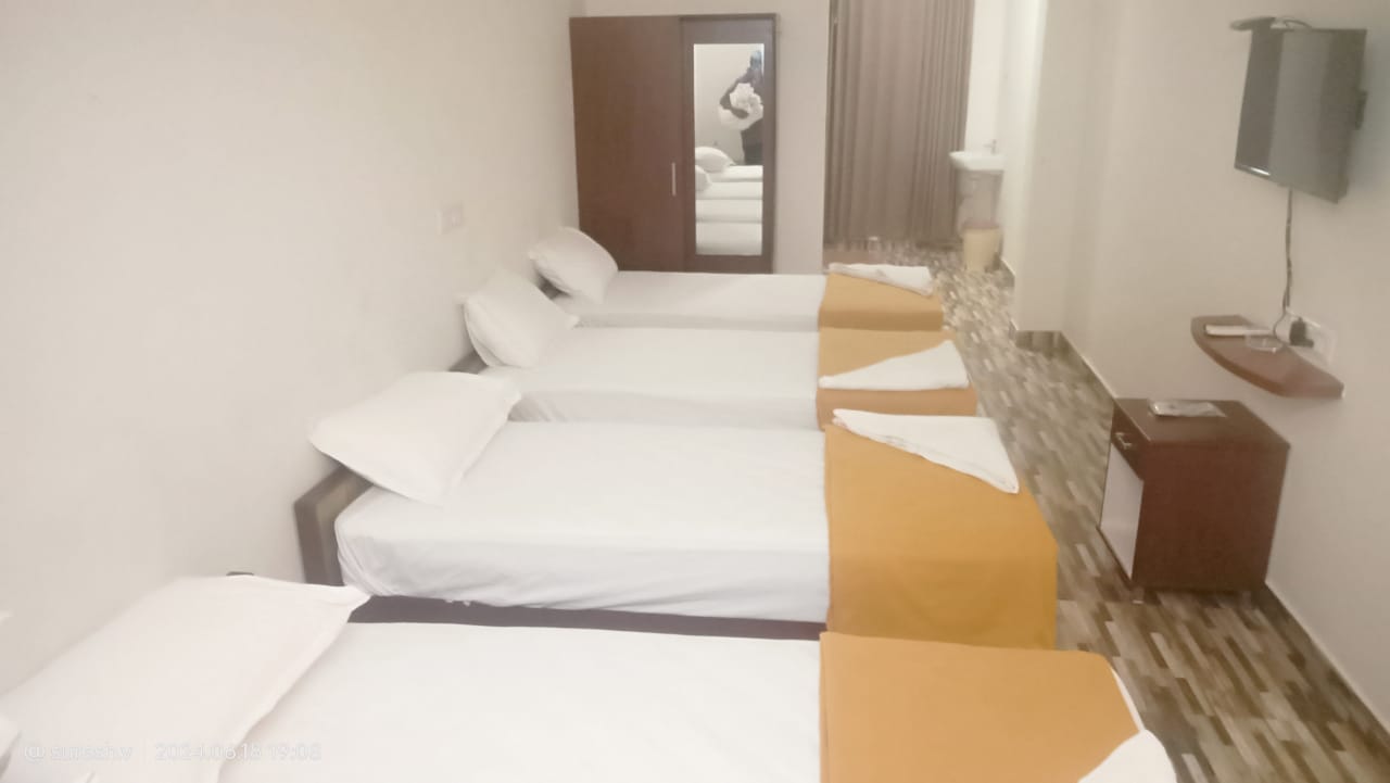 Four Bed Room with kitchenette at Sivavel Residency